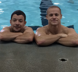 Tim (left) and Todd (right) Siler taking a break from swimming in 2014.